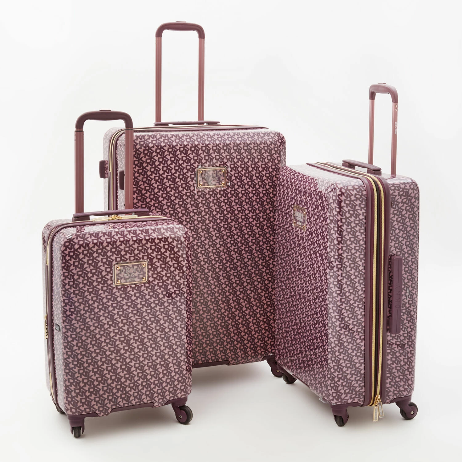 DKNY Aubergine Vintage Hardshell Suitcases 3 DKNY Aubergine Vintage Hardshell Suitcases